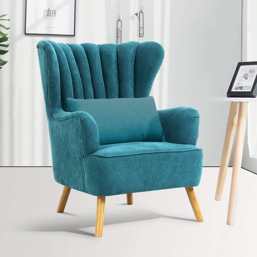 Aqua elvet accent chair with high scalloped backrest and wooden legs