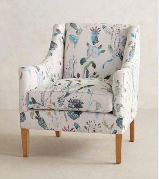 Contemporary accent chair with white floral printed and wooden legs for living room