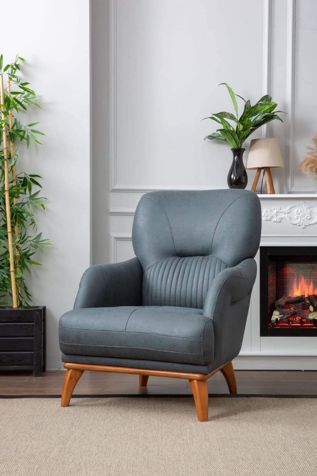 Modern grey upholstered accent chair with ribbed backrest and wooden legs for living room