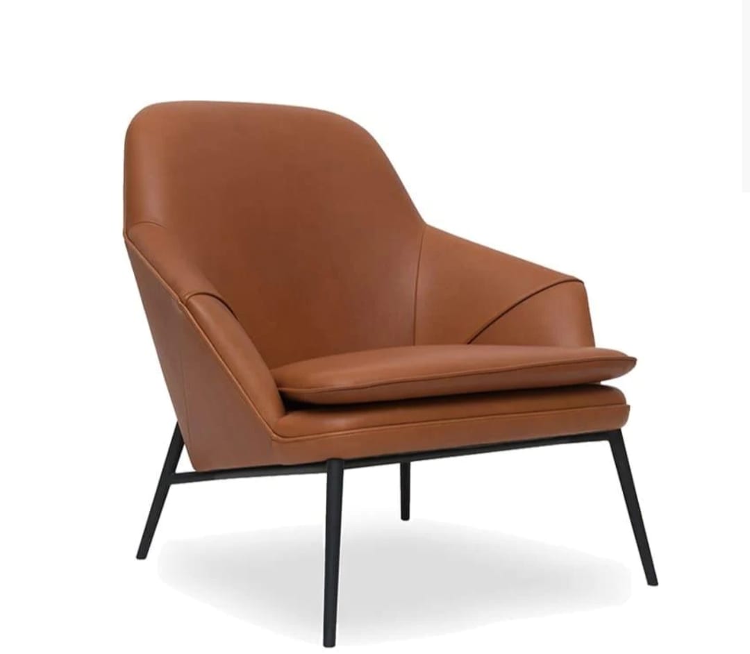 Modern tan leather accent chair with sleek metal legs