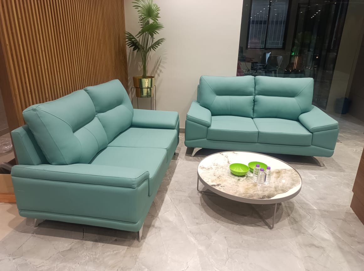 Side view of Modern teal 3+1 seater leatherette sofa set
