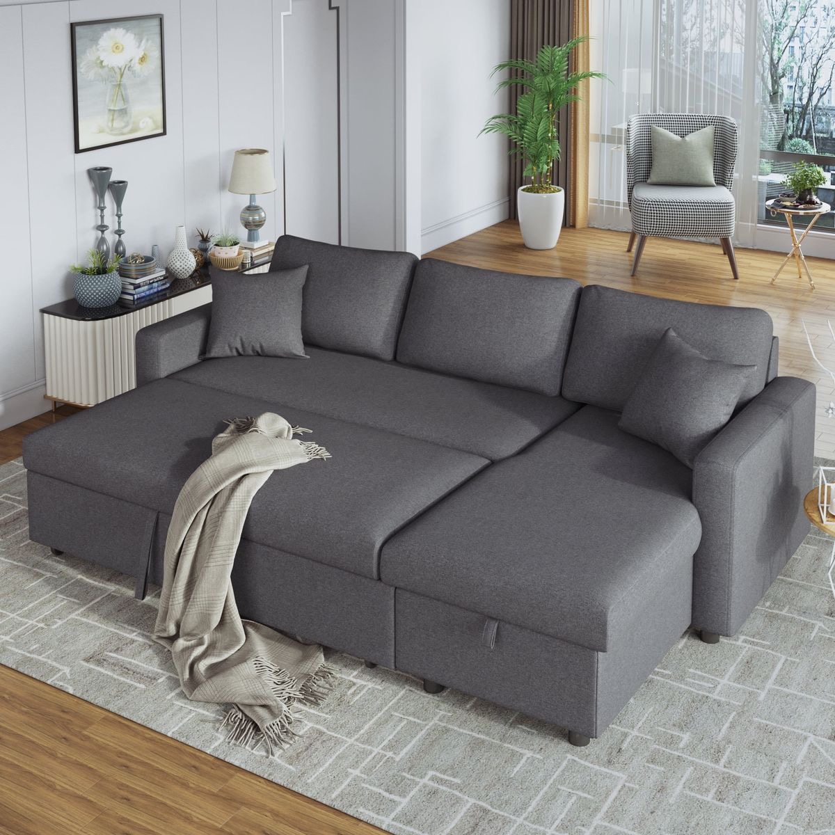 Spacious dark grey L-shaped sofa cum bed with cushions in a modern living room