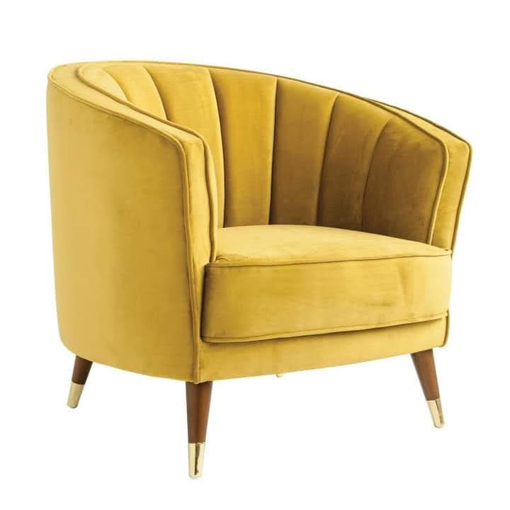 yellow accent chair with wooden legs